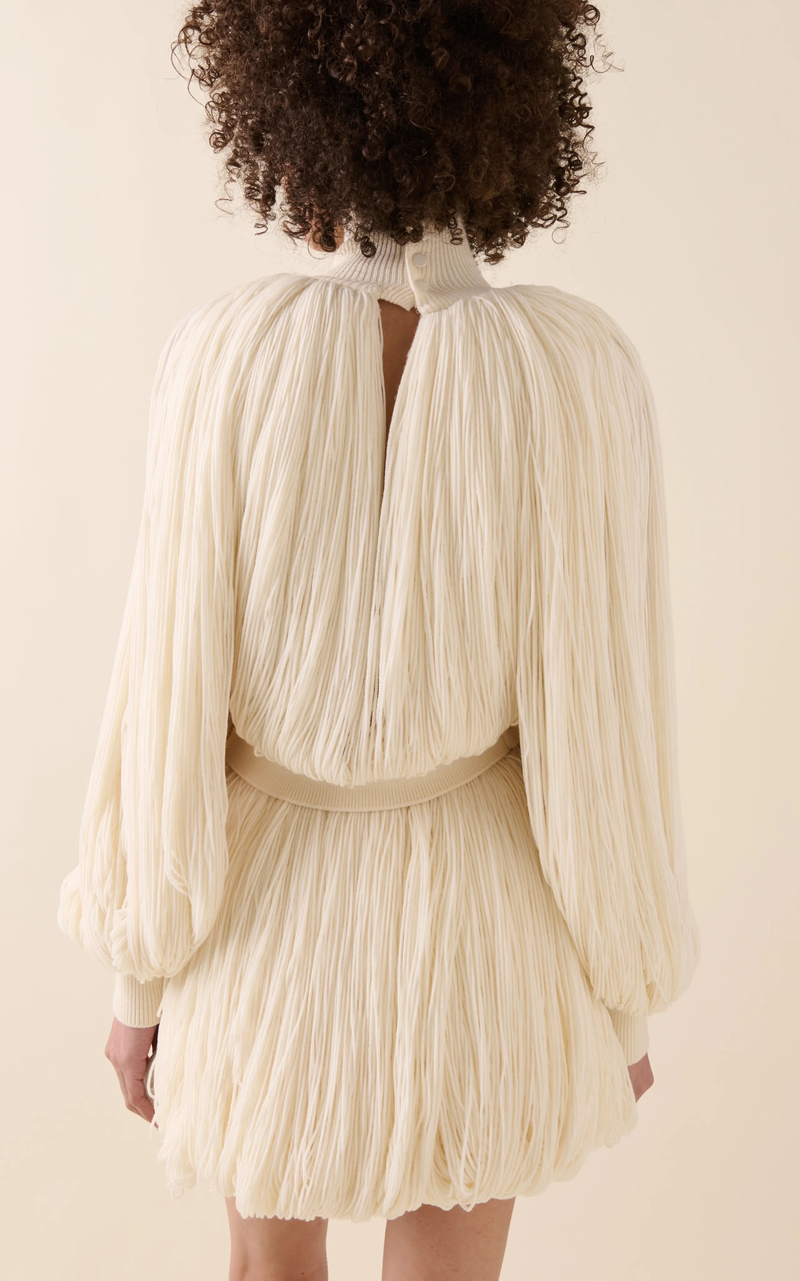 ALAÏA Fringed Yarn Knit Merino Wool Top